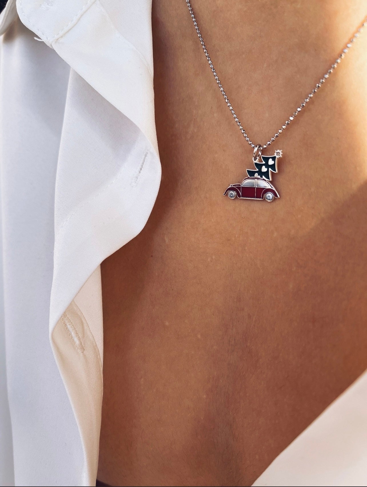 Collana in argento 925 con macchina di Natale smaltata