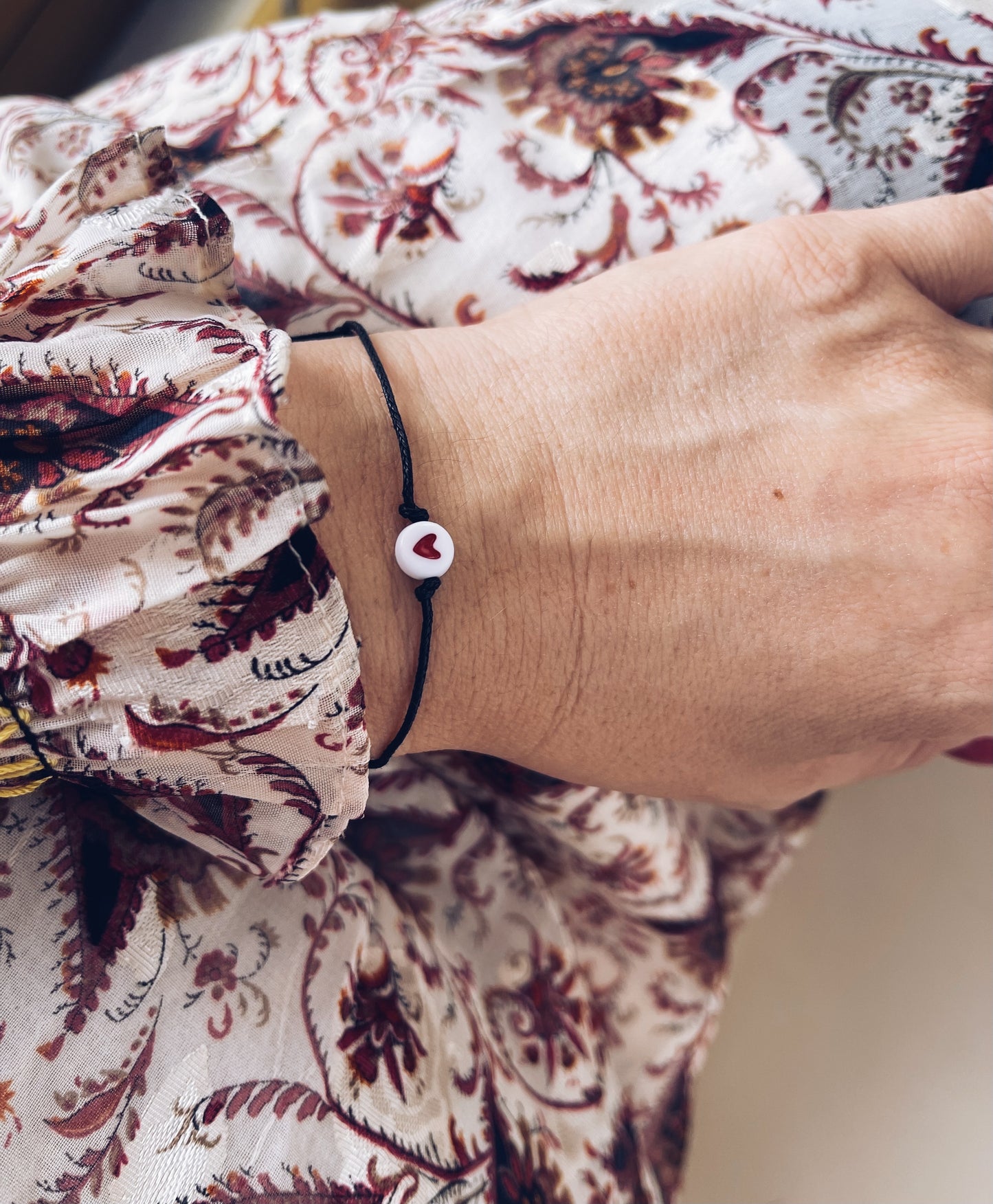 Bracciale con cordoncino e cuore