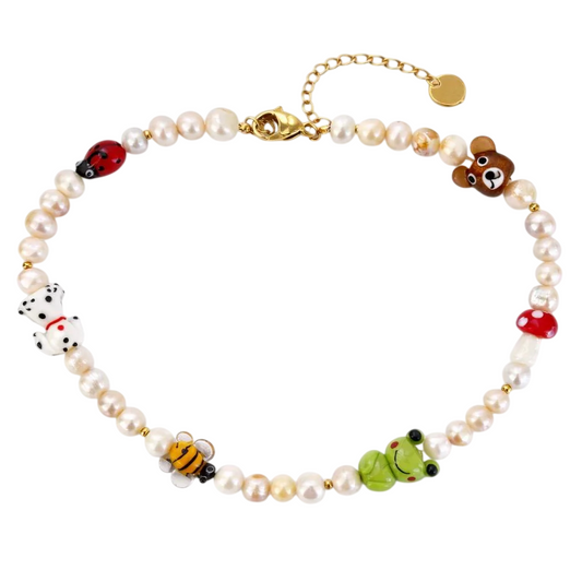 Collana con perle naturali ed elementi in vetro