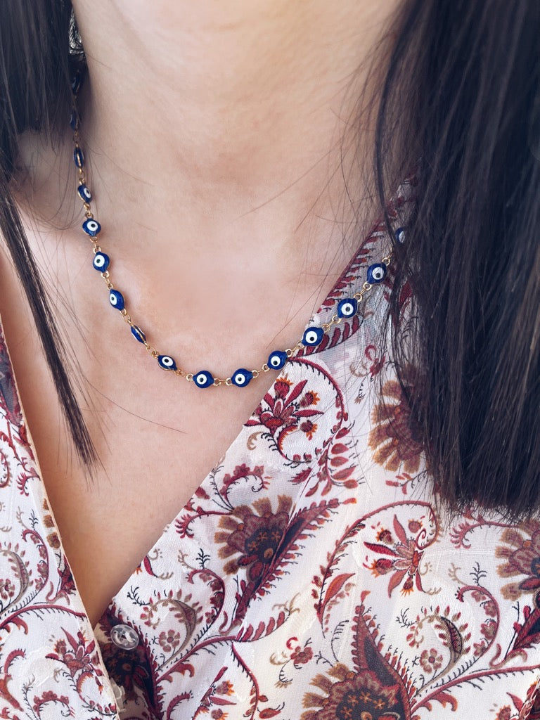 Collana in acciaio con occhi blu smaltati