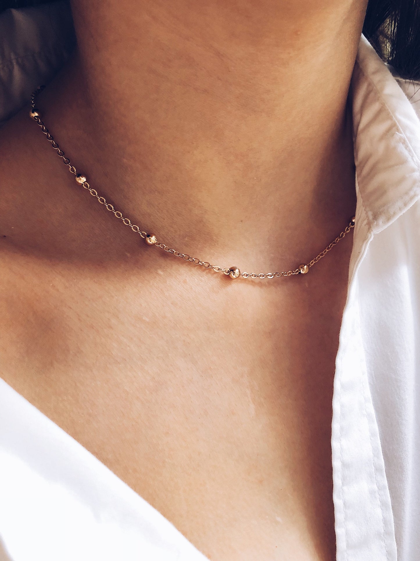 Collana con perline in acciaio