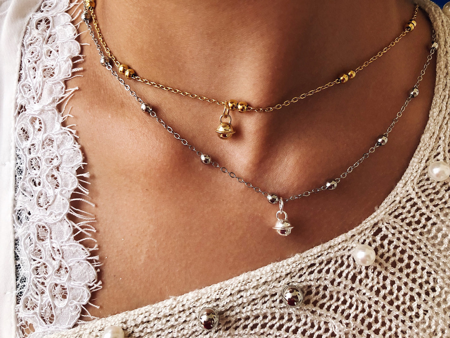 Collana in acciaio e ciondolo campanella