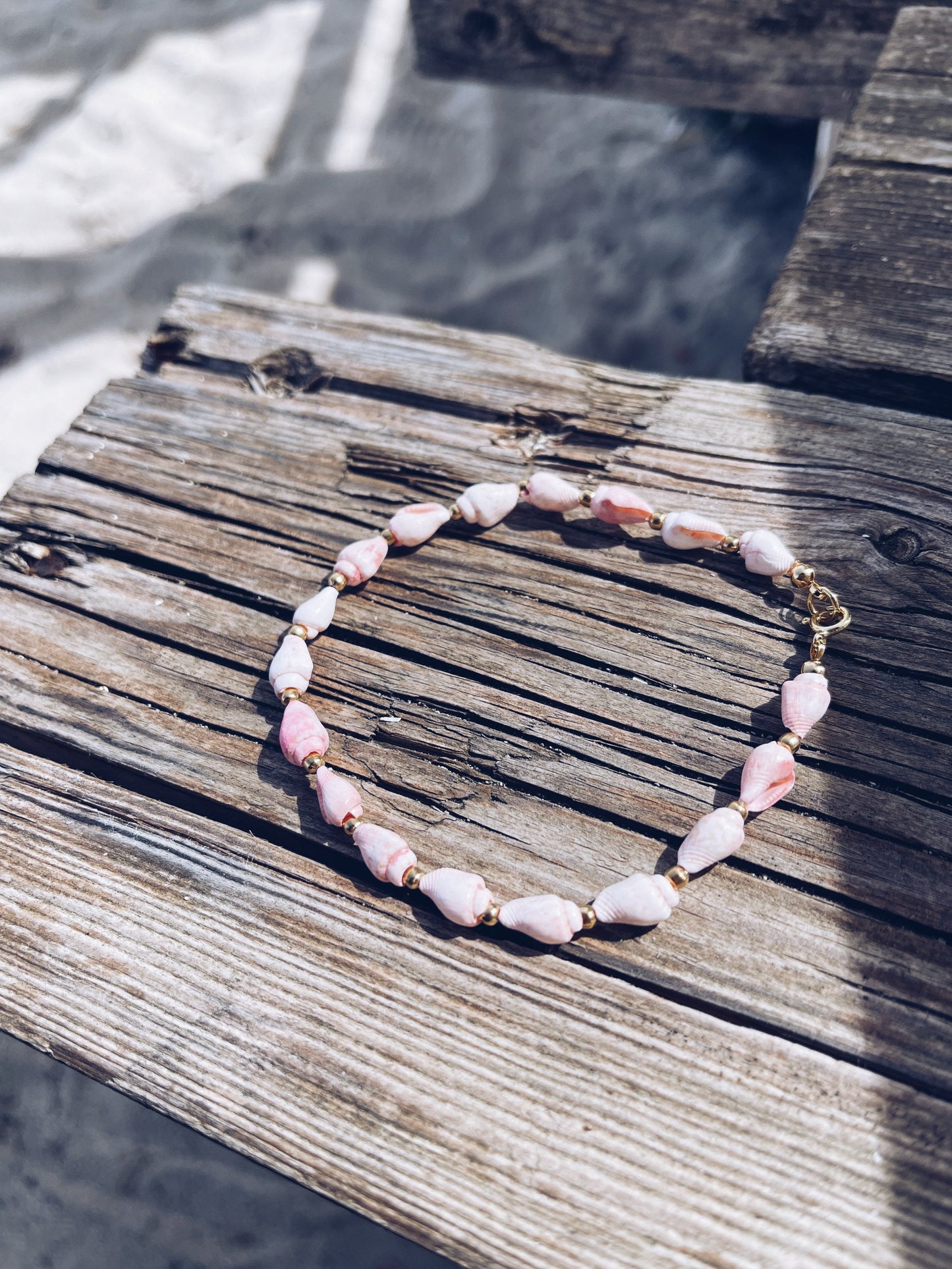 Cavigliera conchiglie rosa