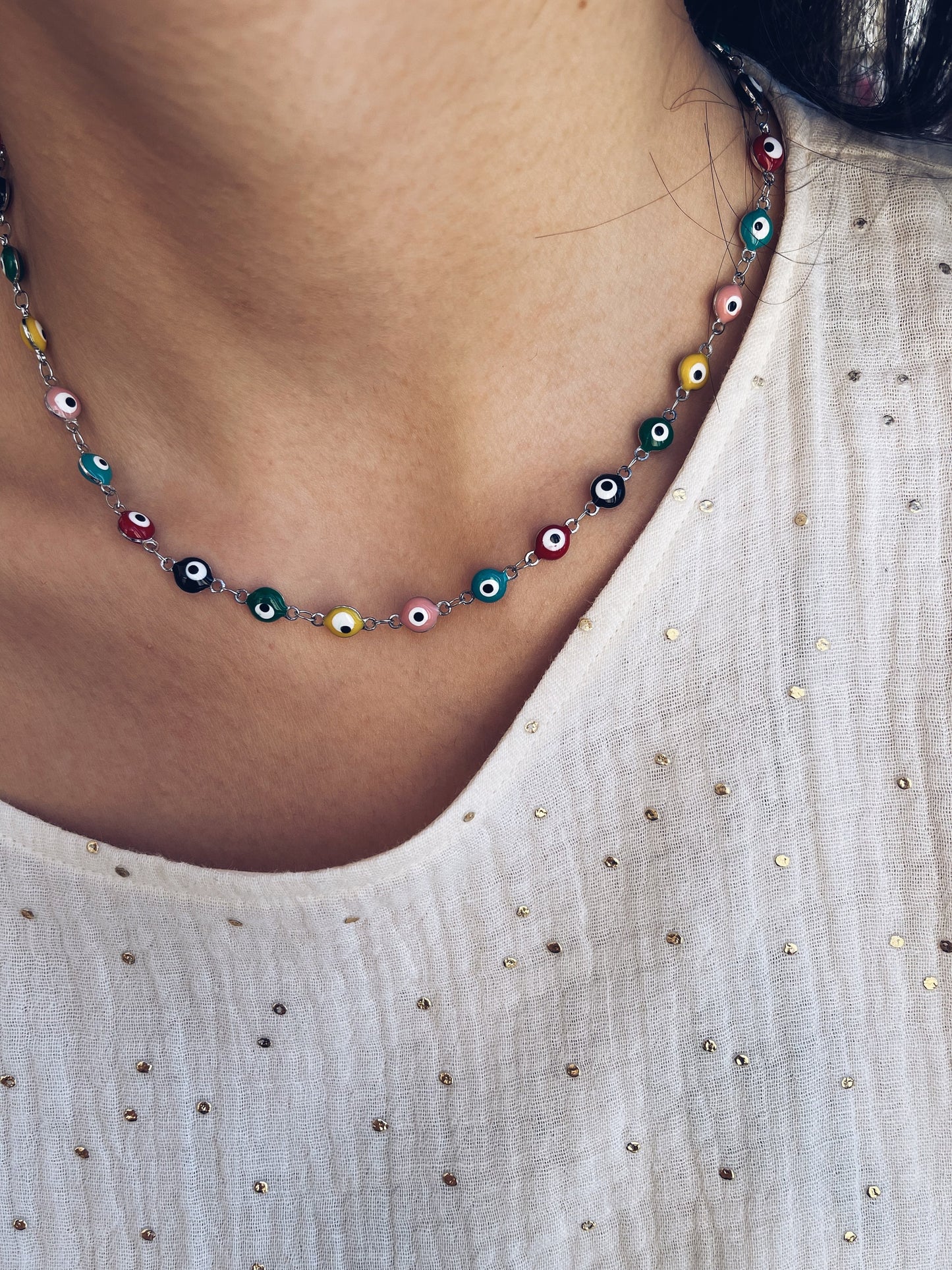 Collana in acciaio con occhi smaltati
