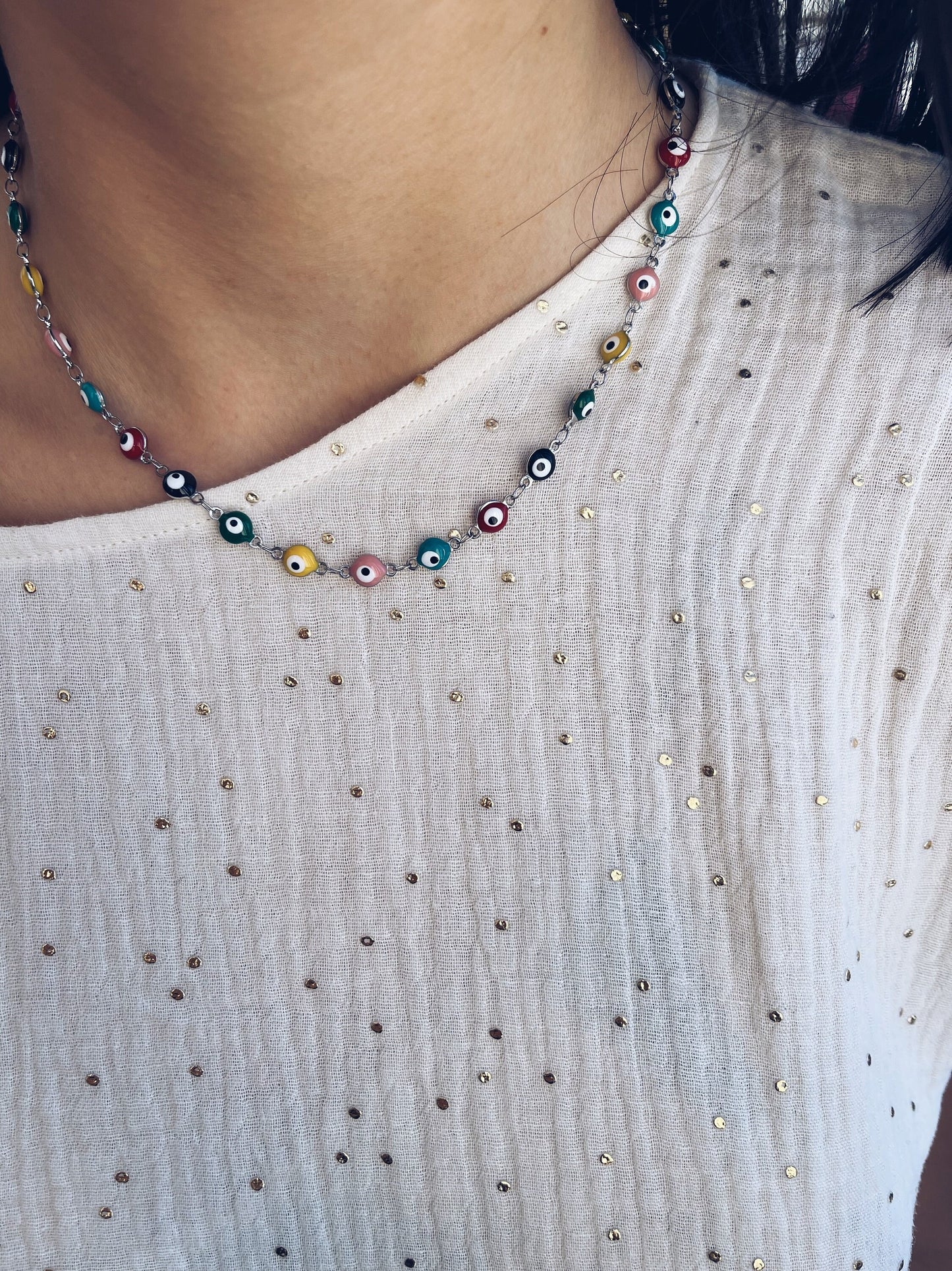 Collana in acciaio con occhi smaltati