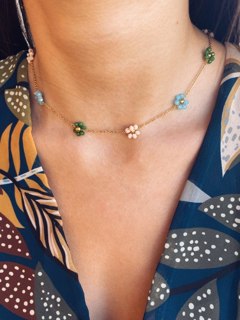 Collana in acciaio con margherite con perline