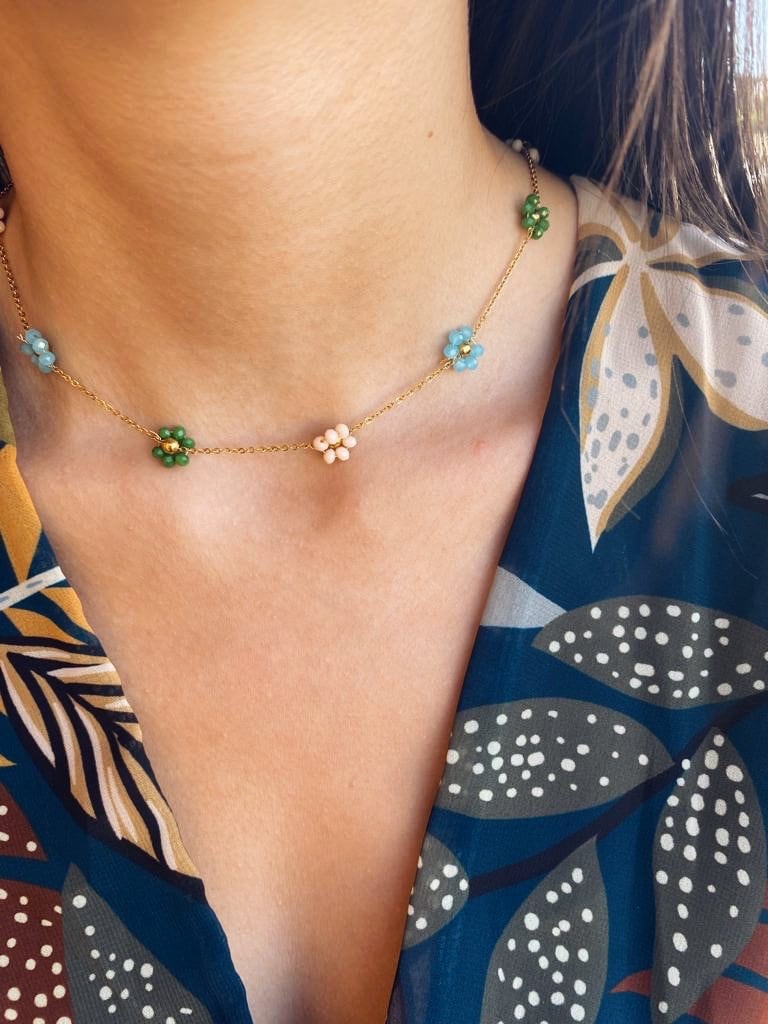 Collana in acciaio con margherite con perline