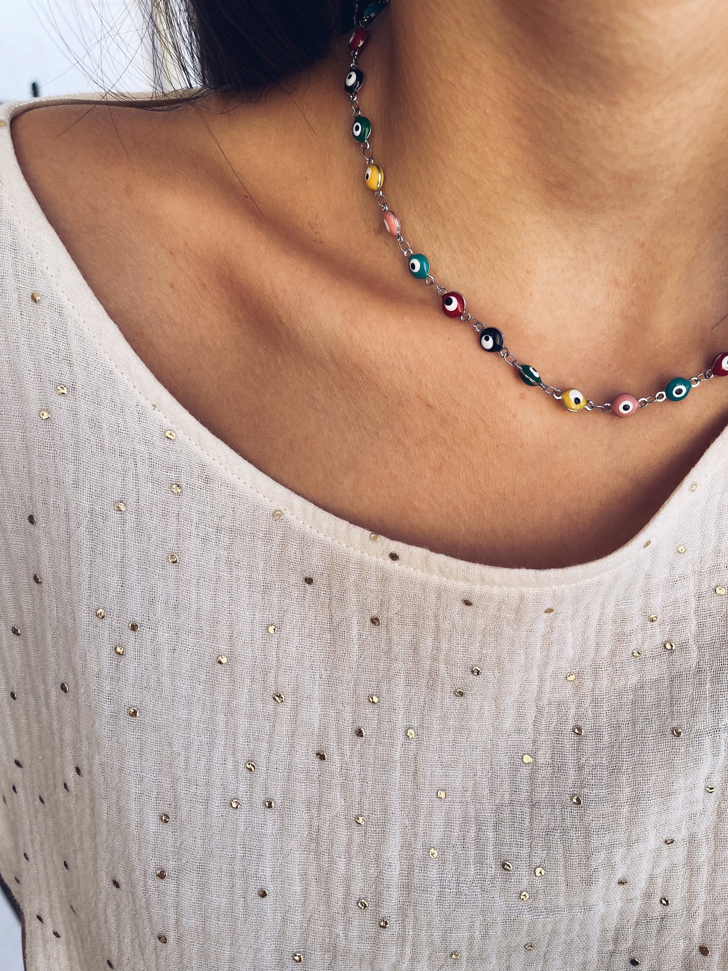 Collana in acciaio con occhi smaltati