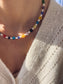 Collana con margherite in vetro di Murano e perle di fiume