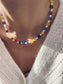 Collana con margherite in vetro di Murano e perle di fiume