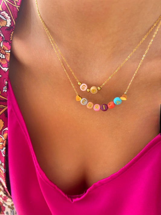 Collana in acciaio con letterine in resina