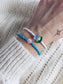 Bracciali con perline in vetro e margherita in madreperla