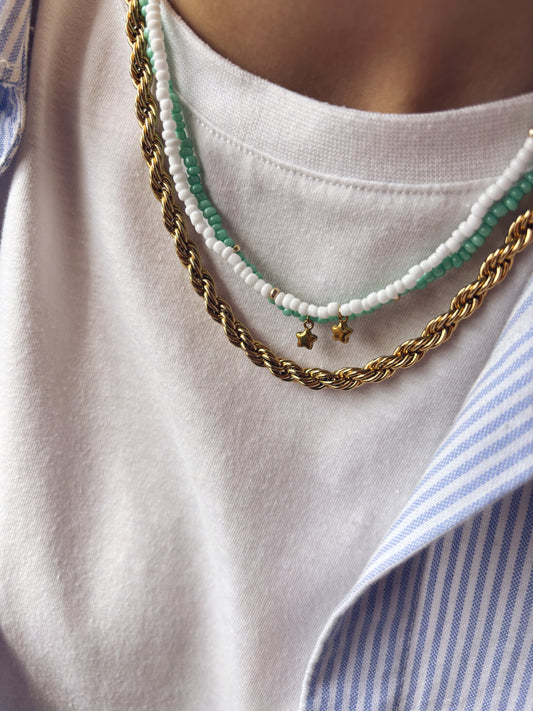 Collana con perline in vetro e stellina in acciaio