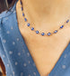 Collana in acciaio con occhi blu smaltati
