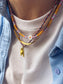 Collana con perline in vetro e margherita in madreperla