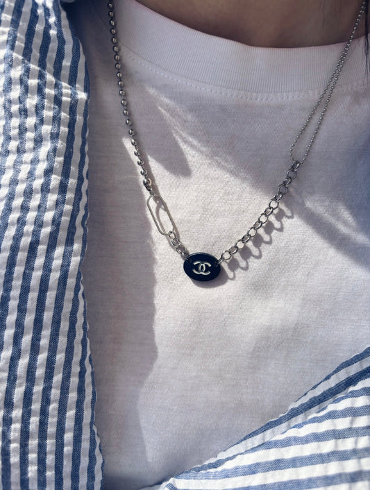 Collana con charm e catena in acciaio
