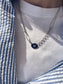 Collana con charm e catena in acciaio