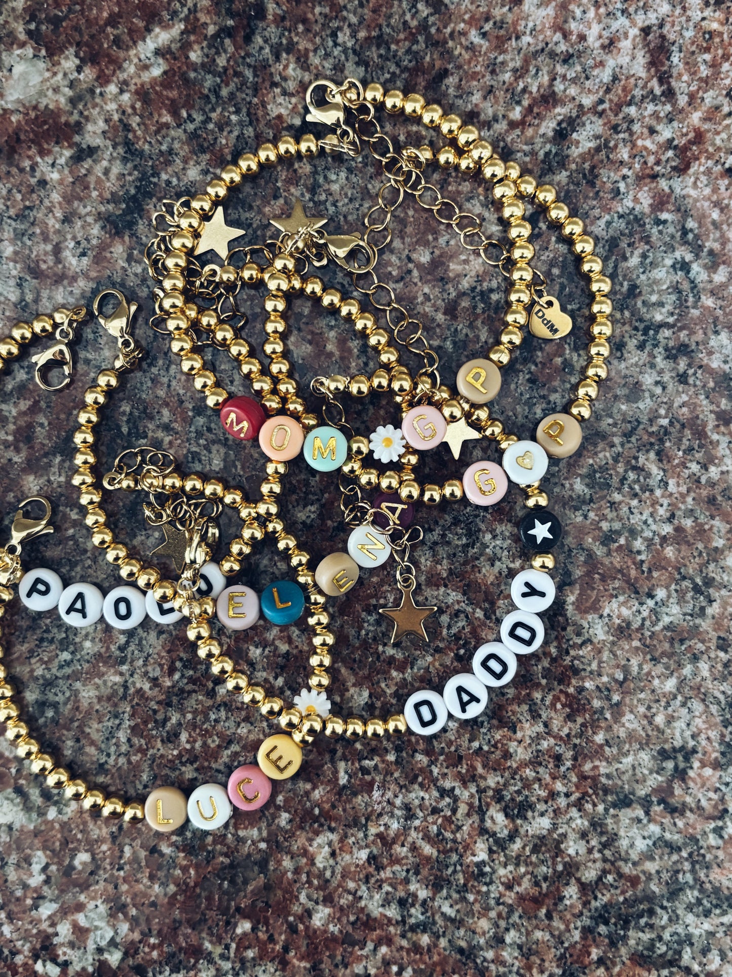 Bracciali con perline in acciaio e letterine da personalizzare