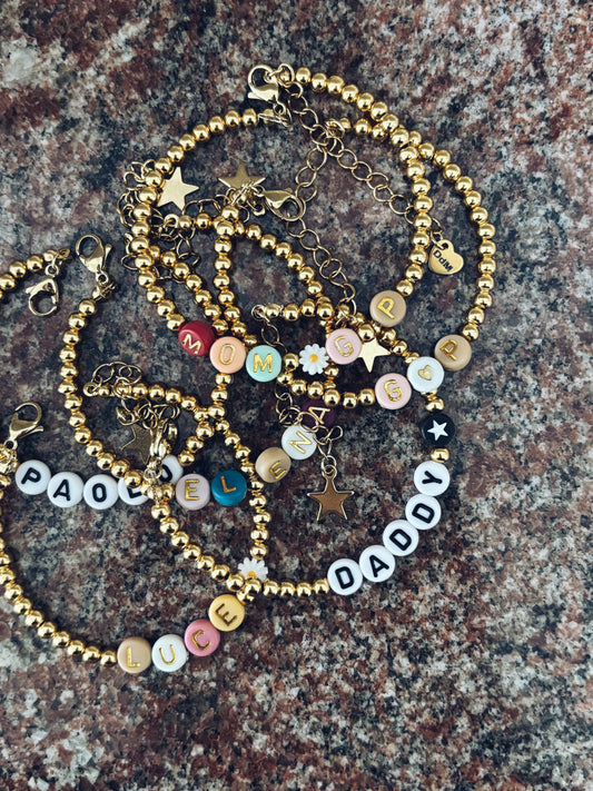 Bracciali con perline in acciaio e letterine da personalizzare