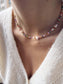 Collana con perline in vetro e margherite in madreperla