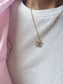 Collana con charm e catena in acciaio