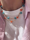 Collana in acciaio con margherite - colori fluo