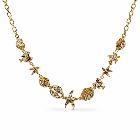 Collana in acciaio oro con soggetti marini con zirconi