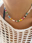 Collana con margherite in vetro di Murano e perle di fiume