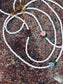 Collana con perline rocailles e tulipano in vetro