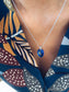 Collana in acciaio con ciondolo vintage in vetro