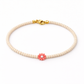 Bracciali con perline in vetro e margherita in madreperla
