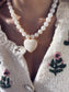 Collana con perline e cuore in resina