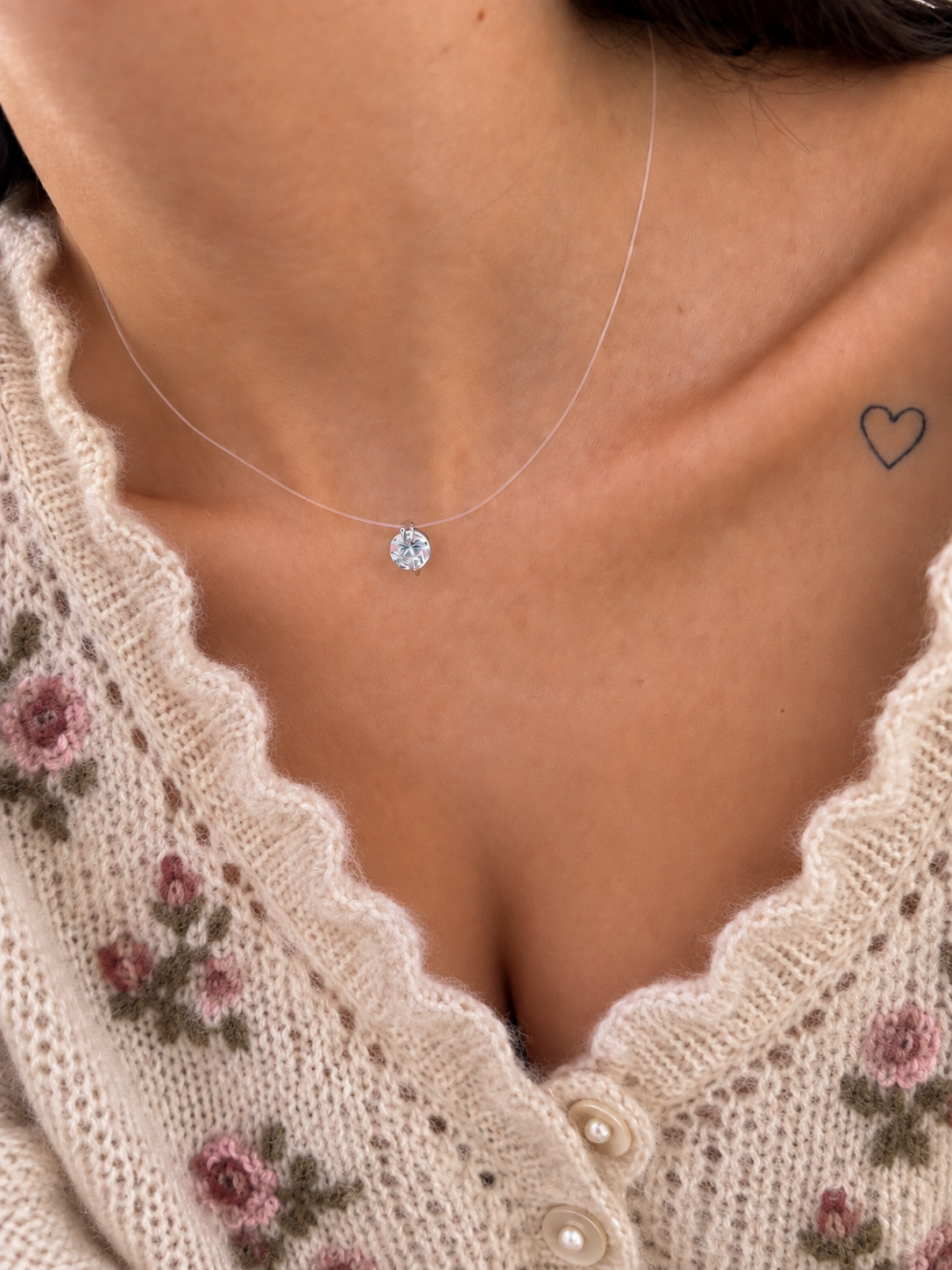 Collana punto luce in acciaio con filo di nylon