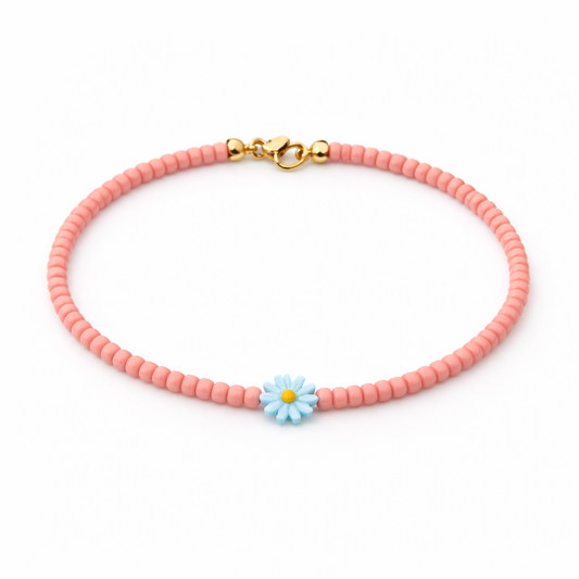 Bracciali con perline in vetro e margherita in madreperla
