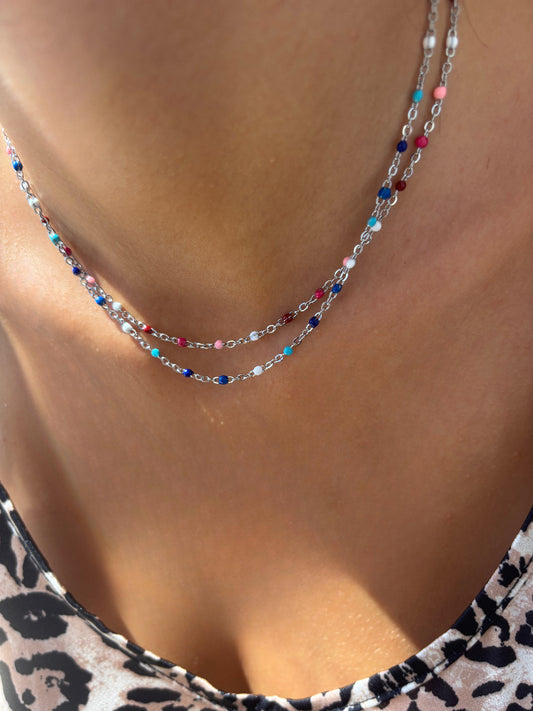 Collana in acciaio con dadini smaltati
