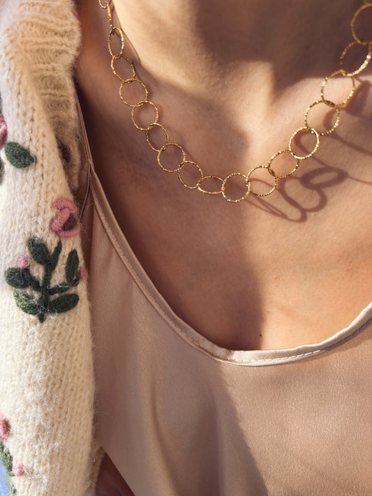 Collana con catena ad anelli in acciaio dorato