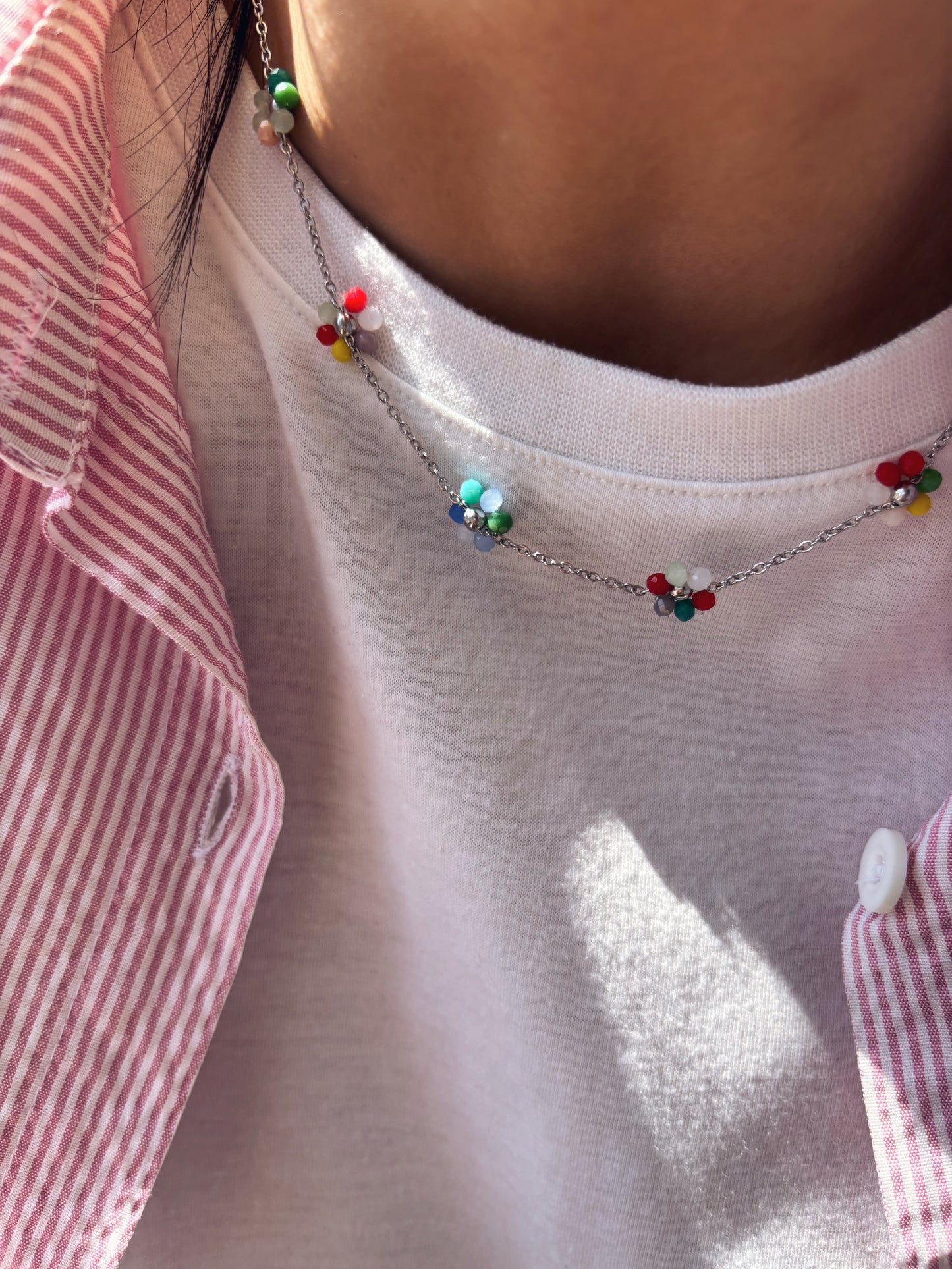 Collana in acciaio con margherite multicolor