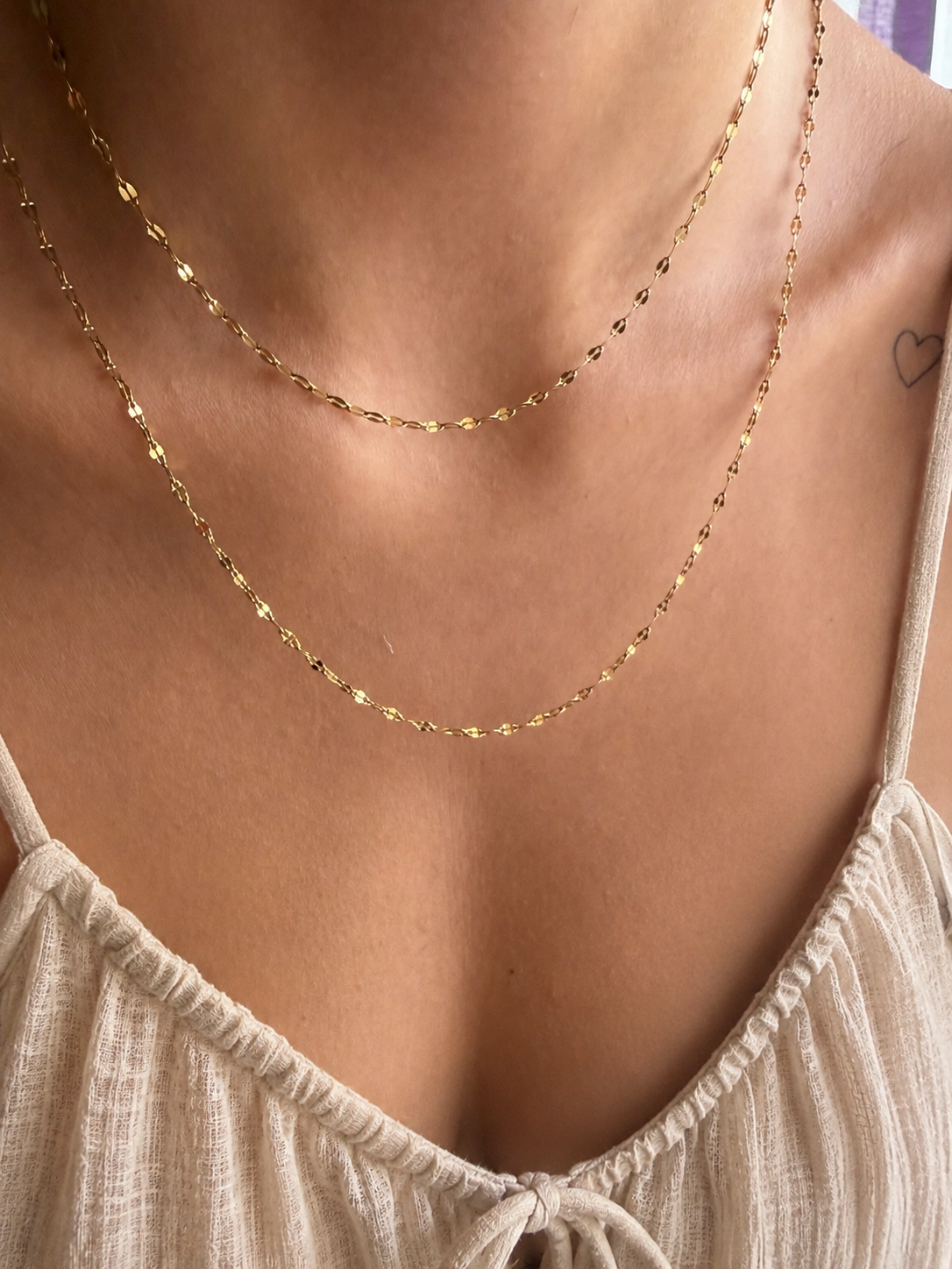 Luce - Collana in acciaio dorato