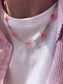 Collana in acciaio con margherite - colori fluo