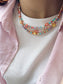 Collana con perline in vetro e margherite in madreperla