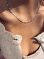 Collana in acciaio con dadini smaltati
