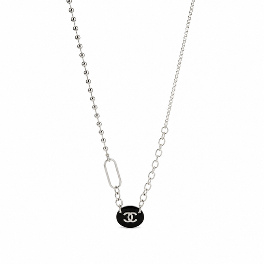 Collana con charm e catena in acciaio