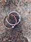Bracciali con perline in vetro e cuore centrale