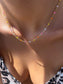 Collana in acciaio con dadini smaltati