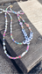 Collana con perline in vetro e letterine