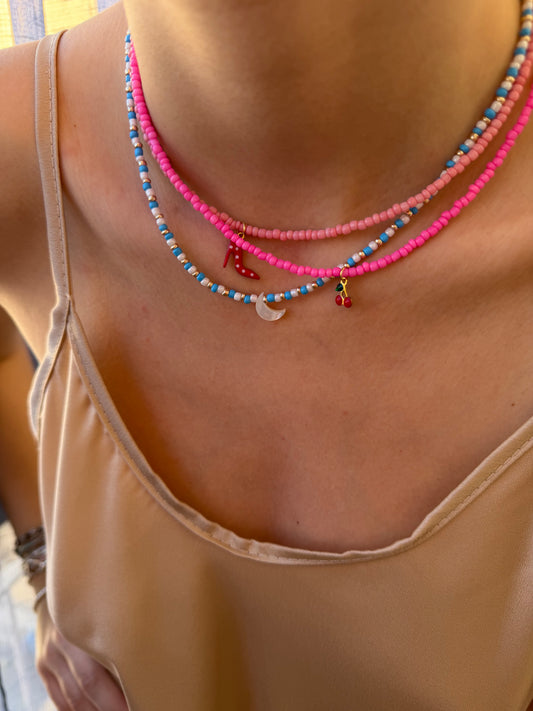 Collana con perline in vetro e luna in madreperla