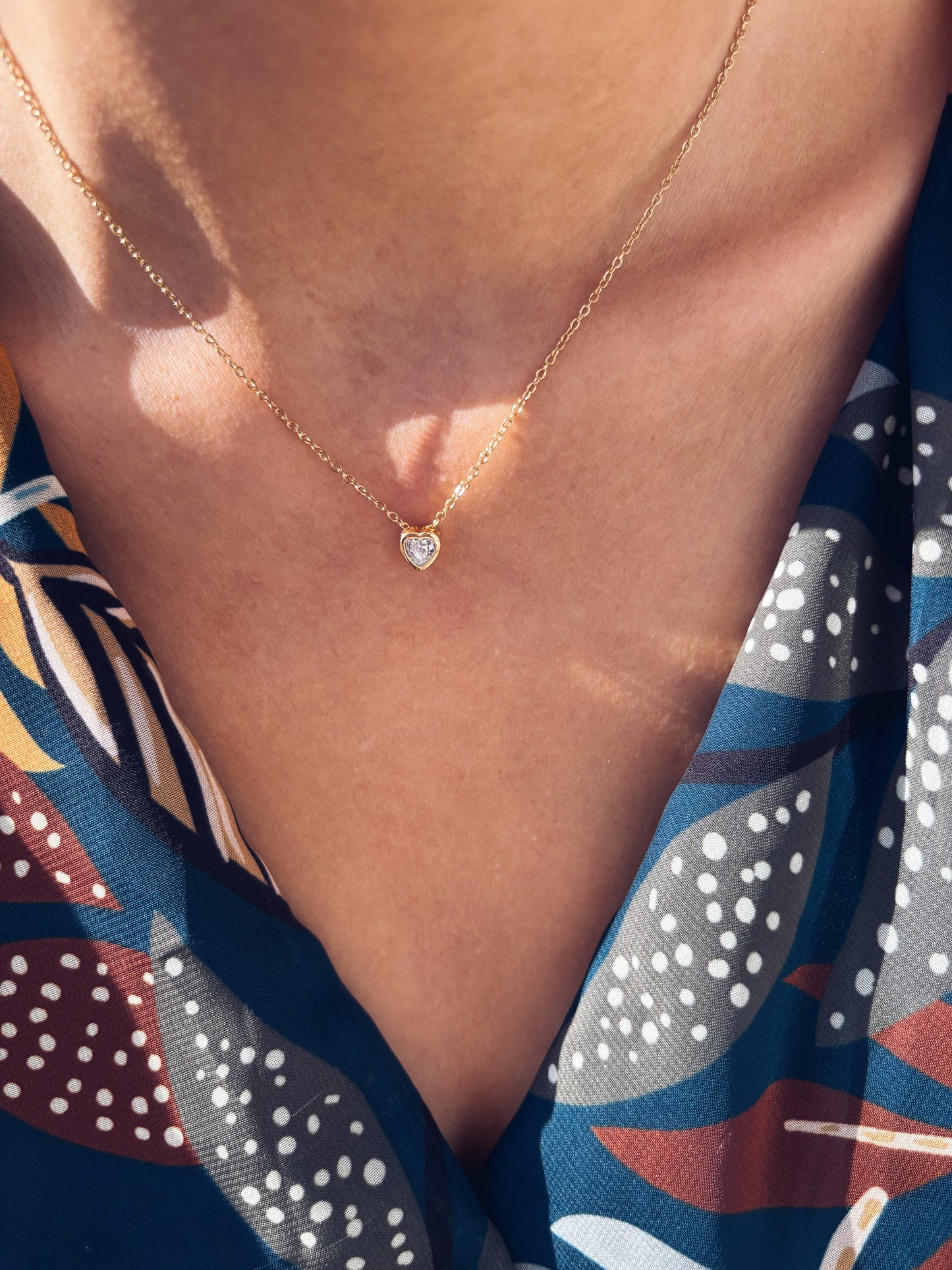 Collana in acciaio con cuore con zircone