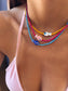 Collana con perline in vetro e pesce in ceramica