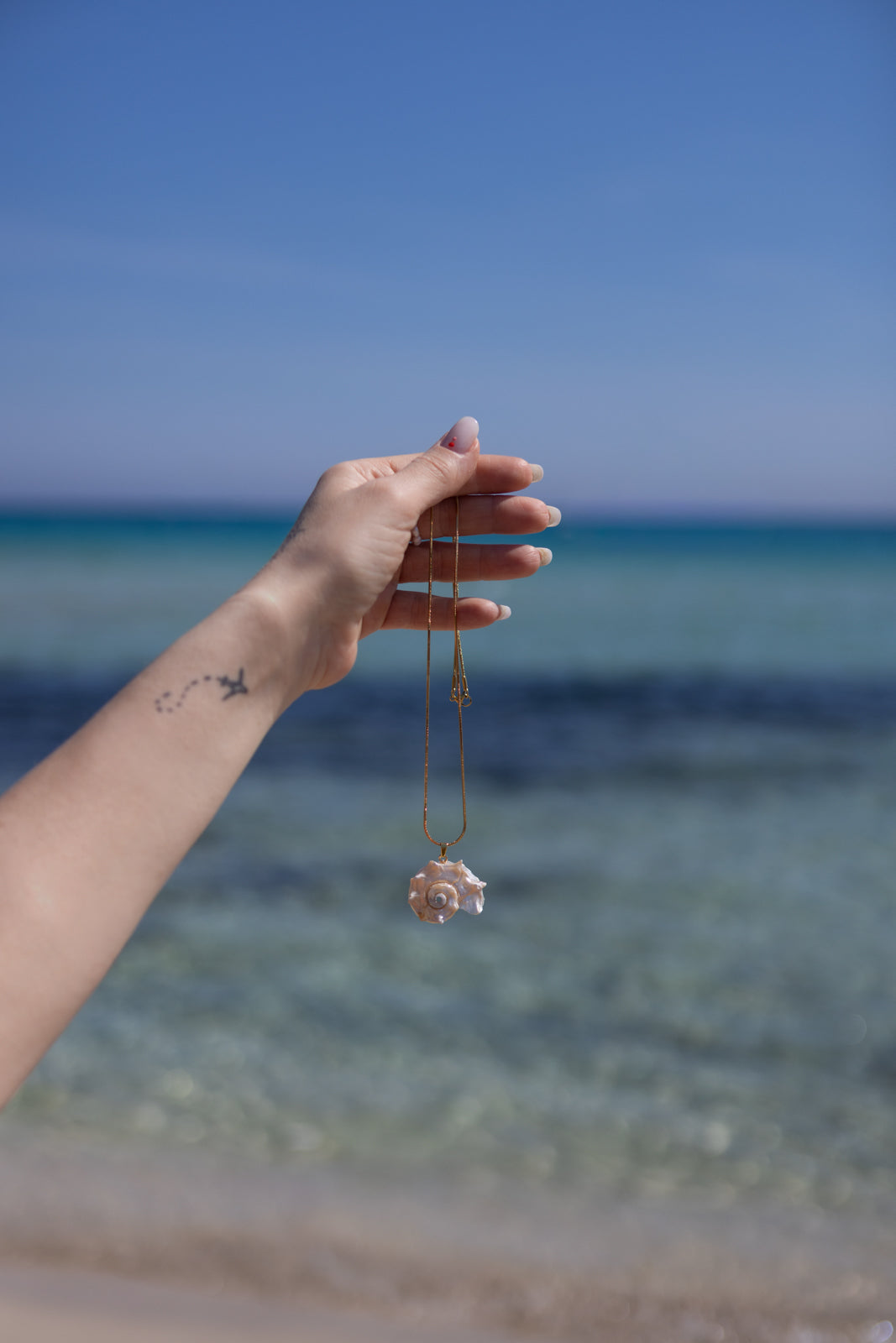 Collana in acciaio con maxi conchiglia