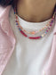 Collana con perline in vetro e margherita in madreperla